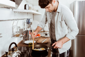 man-cooking-eggs